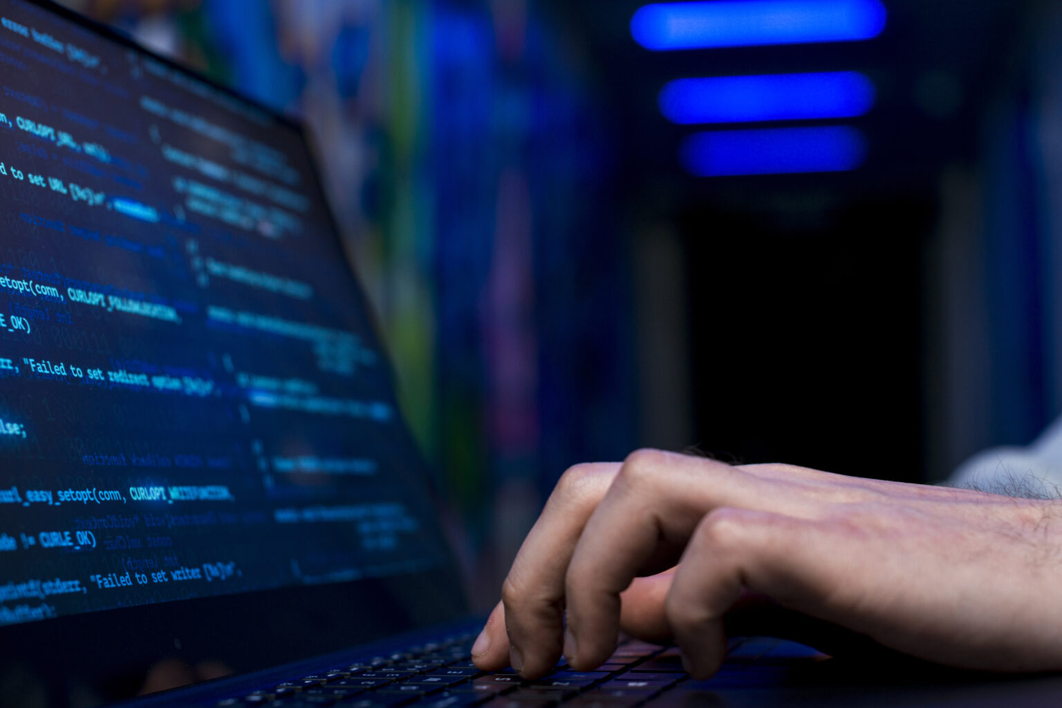 a person typing on a laptop