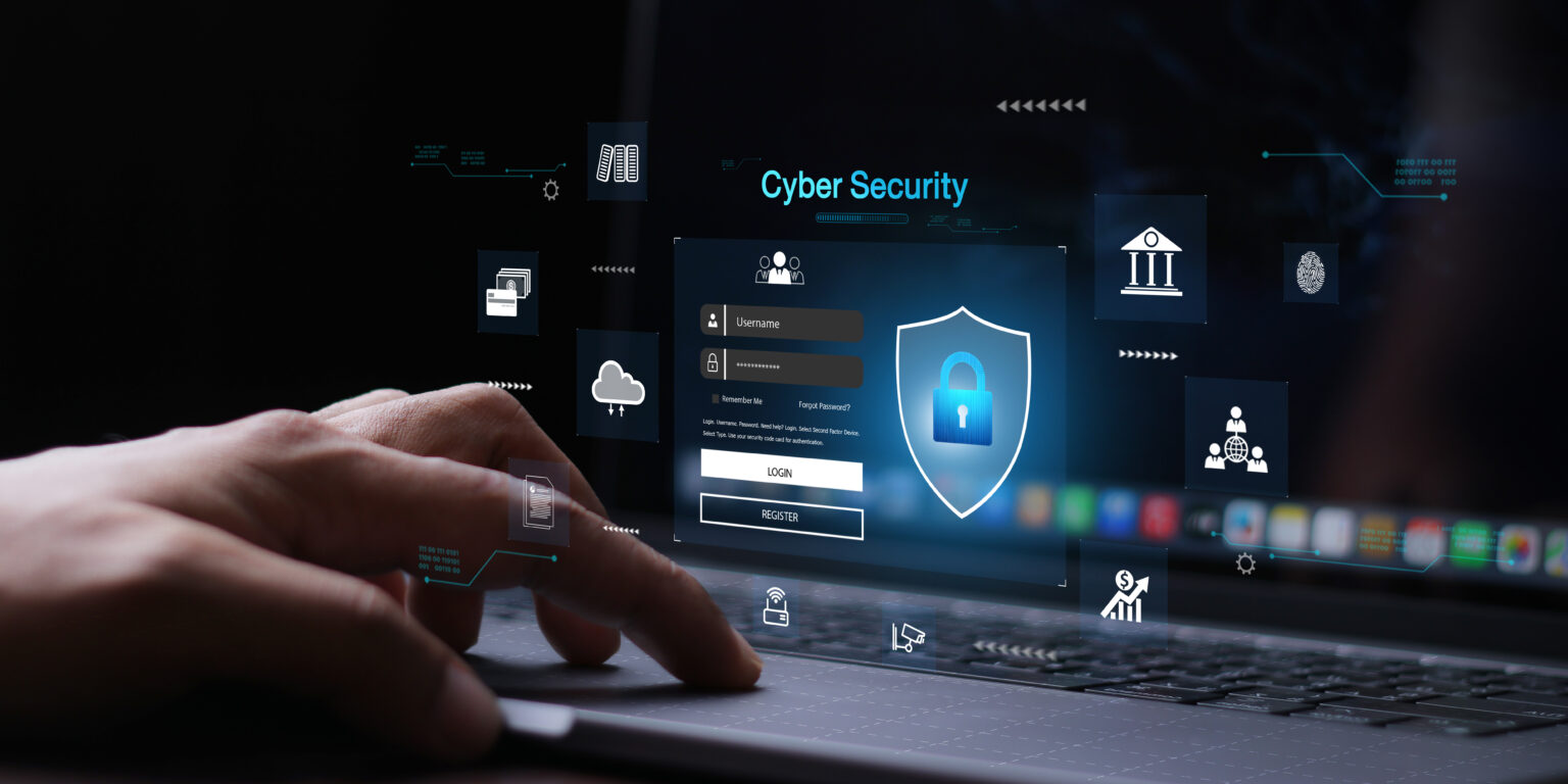 a hand typing on a keyboard
